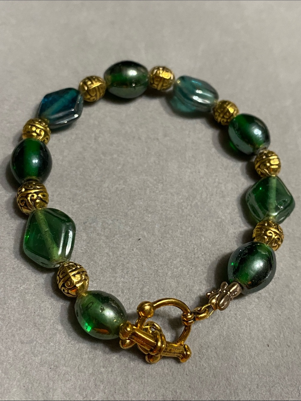 Green Glass and Gold Bead Stretch Bracelet